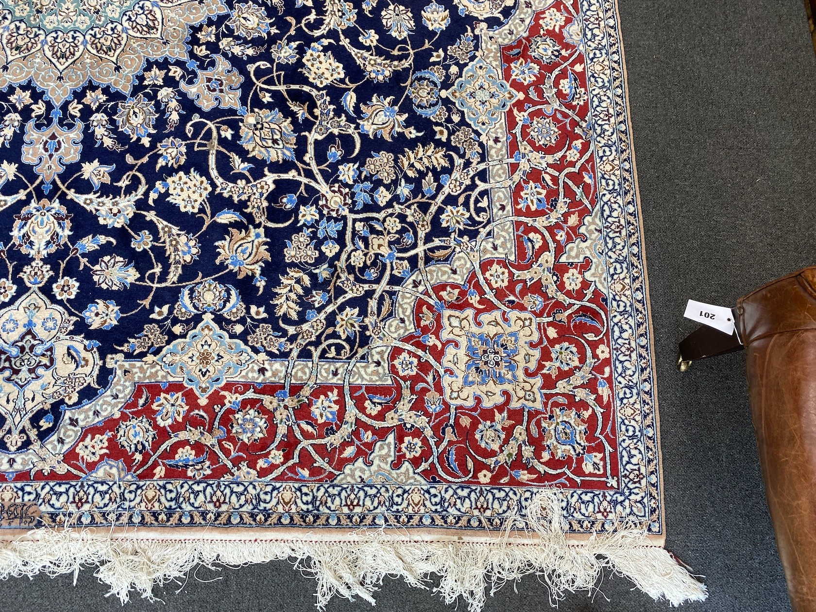 A North West Persian blue ground part silk rug, 220 x 217cm together with a similar smaller red ground rug